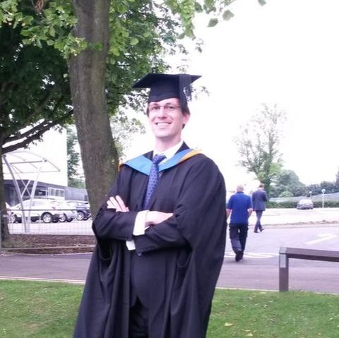 Image of Dr. Stefan Bellinghausen wearing graduation robes